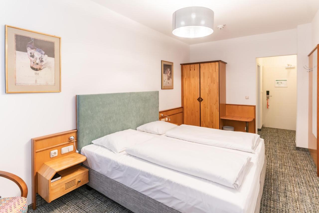 Altstadthotel Grauer Wolf Эрланген