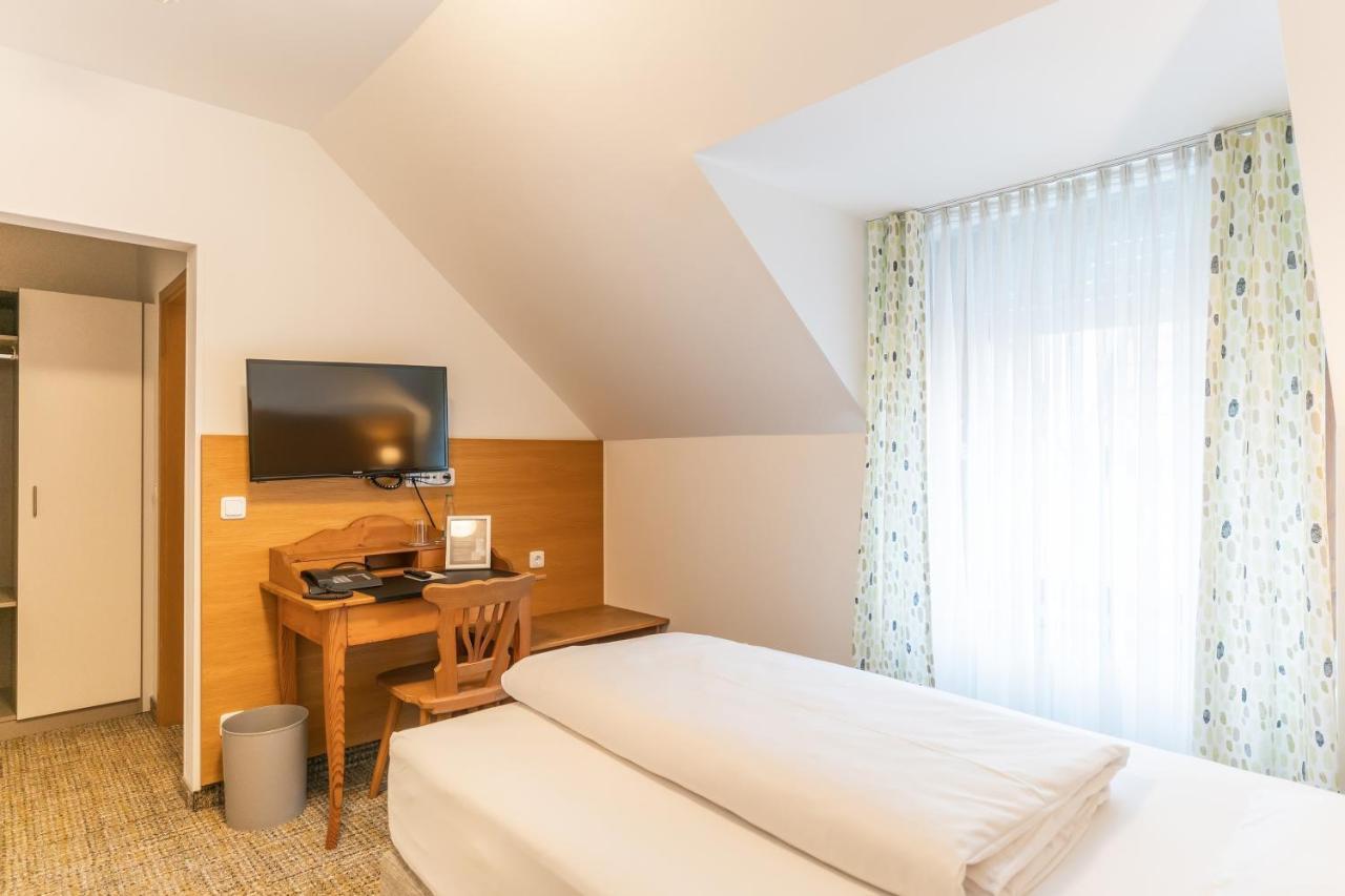 Altstadthotel Grauer Wolf Отель Эрланген